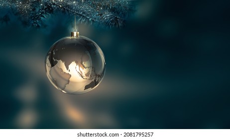 Christmas Ball with World Map on Dark Background. merry christmas