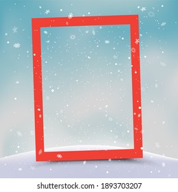 Christmas Red Vertical Photo Frame In Blue Sky Background. Winter Hills And Falling Snow. Holiday Snapshot Template In Nature Backdrop