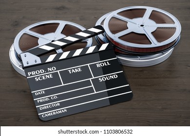 Cinema concept. Clapperboard with film reels on the wooden table, 3D rendering