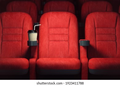 Cinema movie theater concept background. Red cinema seats and coffee or cola paper cup in empty theater. 3d illustration