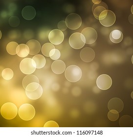 Circles of light on green , gold, brown background with space for your text