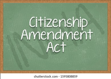 Citizenship Amendment Act Written On Green Black Board With India As A Background.