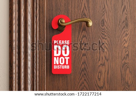 Classic door with empty label "do not disturb". 3d illustration