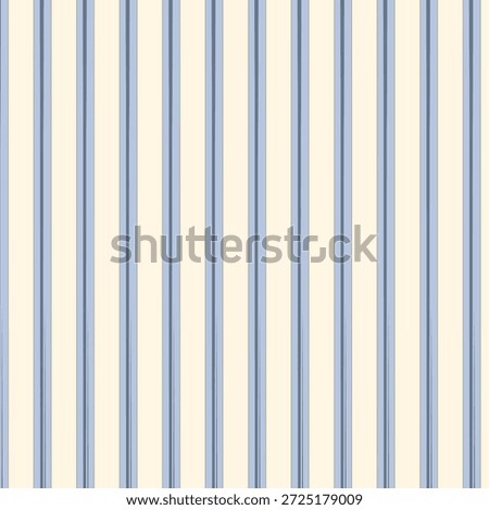 A classic striped pattern featuring bold, mid-scale vertical stripes. The color palette consists of an off-white or brilliant white base, light sky blue stripes, and thinner, darker midnight blue