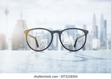 Clear View Concept With Eyeglasses With Transparent Lenses On Marble Surface And Blurry City View On Background. 3D Rendering