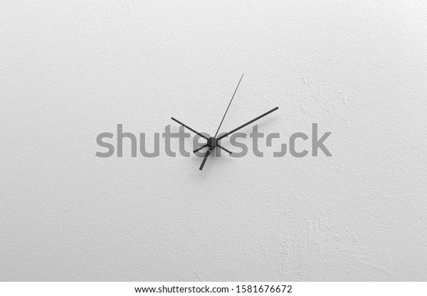 Clock hands on a blank dial without numbers on\
a white background. Creative conceptual illustration with copy\
space. 3D\
rendering