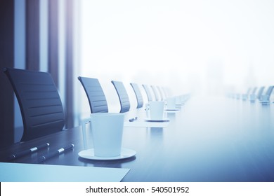 Close up of coffee cup, pens and paper sheet on wooden conference table. Filtered image. 3D Rendering - Powered by Shutterstock