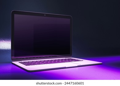 Close up of creative neon purple light gaming notebook with mock up place. 3D Rendering