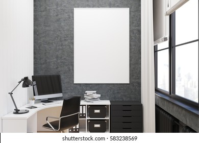 Close Up Of An Office With Gray Walls. A Computer Monitor Is Standing On A White Table In Front Of A Window. There Is A Vertical Poster On The Wall. 3d Rendering, Mock Up