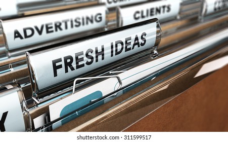 Close up on a file tab with the text fresh ideas, focus on the main tab and blur effect. Concept image for illustration of an advertising company.