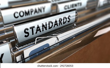 Close Up On A File Tab With The Word Standards, Focus On The Main Word And Blur Effect. Concept Image For Illustration Of Quality Standard