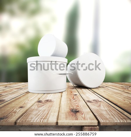 Close up of paint containers on the table