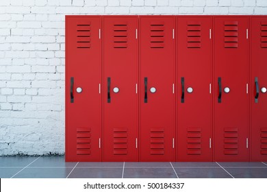 Close up of red lockers in school corridor with white brick walls and tile floor. 3D Rendering