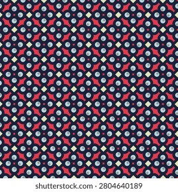 Close up of repeating red and white circular dots forming a seamless pattern on dark backdrop