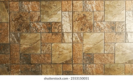 a close up view of a tiled surface. The tiles are arranged in a pattern and have a variety of earthy tones, including shades of brown, beige and tan. The tiles have a textured apperance.