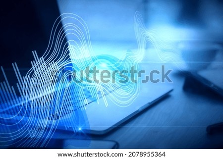 Close up of workspace with laptop computer and digital sound wave on blurry background. Technology, music, frequency and energy concept. 3D Rendering
