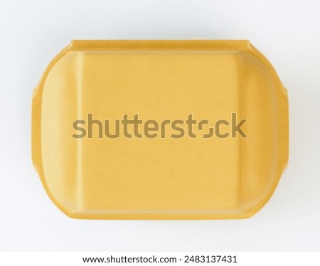 A closed egg box carton packaging for half a dozen eggs on an isolated background - 3D render