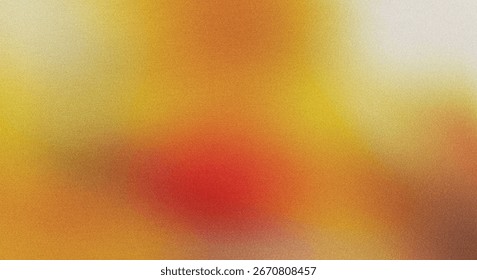 A close-up, abstract image featuring a blend of warm colors, primarily orange and yellow, with a striking red element at the center.