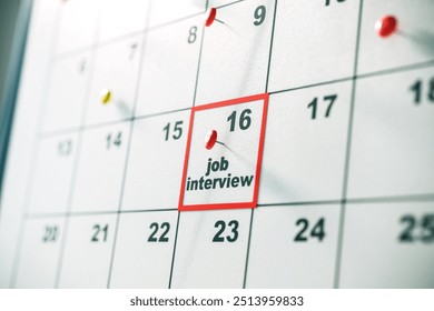 Closeup of a calendar pinned to a wall, highlighting a job interview on the 16th. Concept of planning, scheduling, and important events. 3D Rendering - Powered by Shutterstock