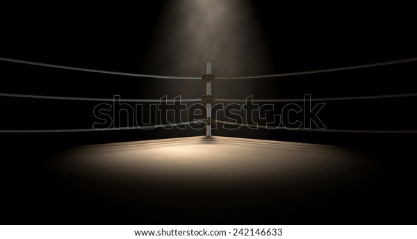 A closeup of the corner of an old vintage\
boxing ring surrounded by ropes spotlit by a spotlight on an\
isolated dark\
background