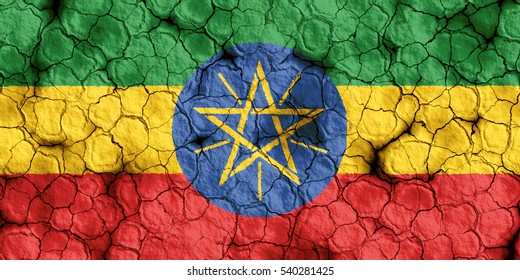 Close-up Of Ethiopia Flag On A Cracked Soil, Background Texture (High-resolution 3D CG Rendering Illustration) Famine And Drought, Natural Disaster.