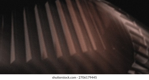 A close-up, grainy image capturing parallel vertical bands of warm light cast across a dark, textured surface, creating a dramatic and abstract visual effect with strong tonal variation. - Powered by Shutterstock - Get 15% off with code: PIKWIZARD15