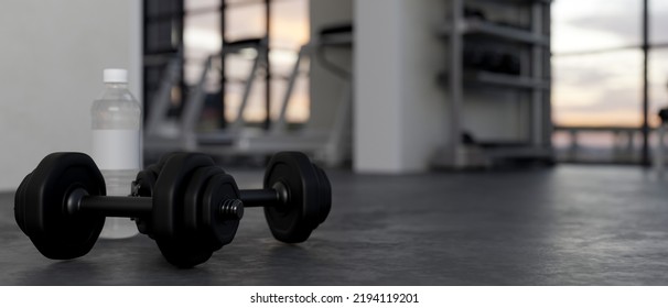 Close-up Image, Dumbbells And A Bottle Of Water On A Black Gym Floor Over Blurred Modern Fitness In The Background. 3d Rendering, 3d Illustration