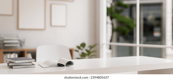 Close-up image of a study table or office desk workspace with books and empty space on the white table in a modern white room. 3d render, 3d illustration