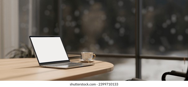 Close-up image of a white-screen laptop computer mockup and a coffee cup on a wooden table in a modern meeting room. boardroom, meeting room. 3d render, 3d illustration