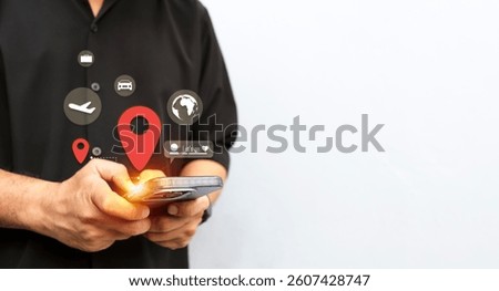 Close-up of a man using a smartphone with GPS and travel icons, representing navigation, location tracking, trip planning, and digital mapping.