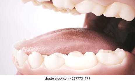 Close-up of a mouth with teeth seamlessly integrated with a dental implant. This image captures the final stage of dental restoration, concluding the series with a perfected smile. - Powered by Shutterstock