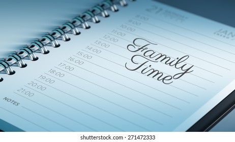 Closeup of a personal calendar setting an important date representing a time schedule. The words Family Time written on a white notebook to remind you an important appointment.