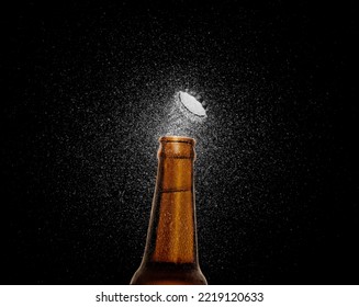 Closeup photo of an amber beer bottle splashing beer drops on a black background. Beer cap flying on top of the bottle. 3d render