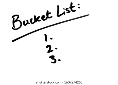 Close-up Of The Phrase Bucket List Handwritten On A Whiteboard.