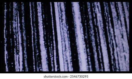 A close-up of the screen texture of an old VHS tape, with a blue color background and a grainy film effect. Photo overlay via blend mode.