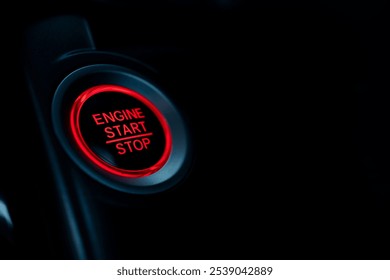 Closeup of start stop ignition button, highlighting modern car technology; sleek design and advanced functionality in vehicle dashboard for high-tech automotive interiors