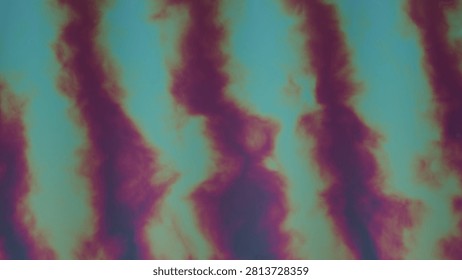 Closeup view of an outoffocus abstract image featuring wavy vertical bands of deep purple and cyan blue, creating a fluid, textured appearance with no discernible objects.