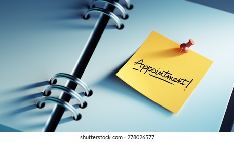 Closeup Yellow Sticky Note paste it in a notebook setting an appointment. The words Appointment written on a white notebook to remind you an important appointment.