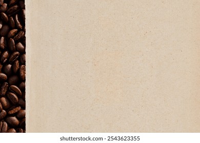 Coffee beans border on a textured beige background. Coffee beans aligned vertically. Brown coffee beans create a rustic feel. Perfect for coffee-themed designs. - Powered by Shutterstock