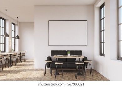 Coffee shop interior with a large sofa near a white wall, a row of tables with chairs near windows and a big horizontal poster on the wall, wooden floor. 3d rendering. Mock up. 