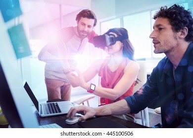 Colleagues using technology in the office - Powered by Shutterstock - Get 15% off with code: PIKWIZARD15