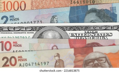 Colombian Peso And US 100 Bill. Close Up Colombian Banknotes And US Banknotes. 3D Render