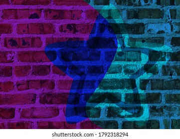 Colored brick background with graphic elements and inscriptions, close-up.