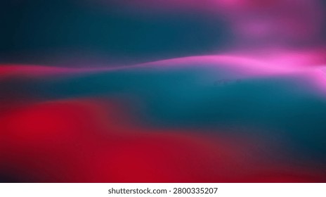 A colorful abstract background featuring a blend of pink, red, and blue colors in a smooth, gradient-like transition, creating a mesmerizing visual effect.