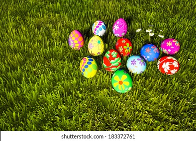 Colorful Easter eggs in green grass