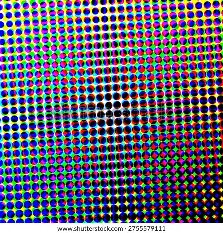 A colorful halftone pattern composed of multicolored dots in blue, red, green, yellow, and pink...
