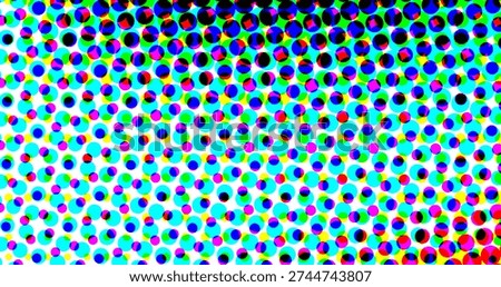 A colorful halftone pattern composed of small multicolored dots on a white background, creating...