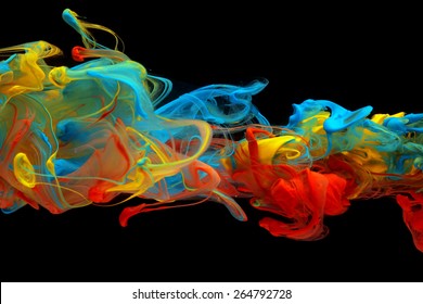 Colorful Ink Swirling Through Water