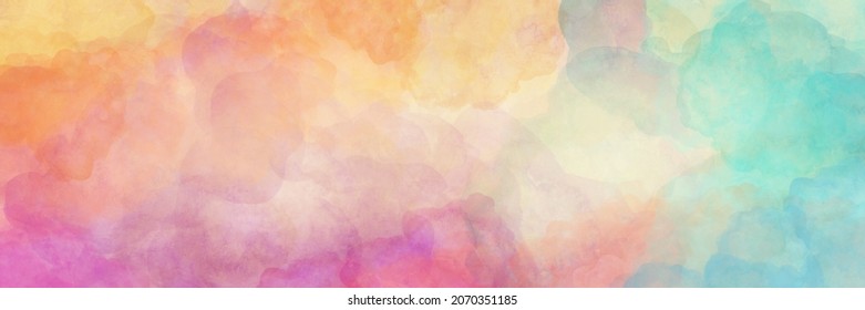 Colorful Watercolor Background Of Abstract Sunset Sky With Puffy Clouds In Bright Rainbow Colors Of Pink Blue Yellow Orange And Purple