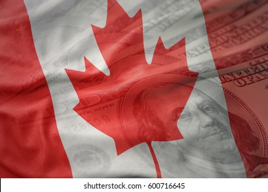 Colorful Waving National Flag Of Canada On A American Dollar Money Background. Finance Concept